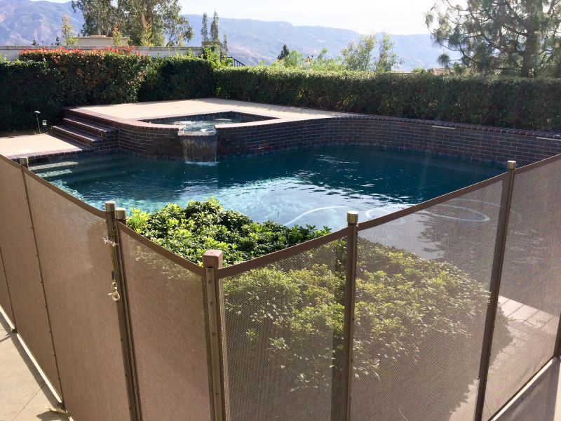 Mesh Pool Safety Fence in Residential Setting